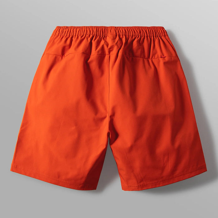 Metro Fusion - Lacoste Men's Lacoste x Netflix Printed Swim Trunks - Men's  Shorts